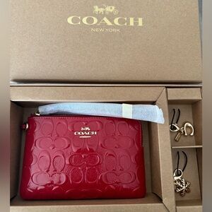 Red Coach Wristlet w/charms NWT